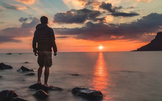 man-looking-out-to-sea-1